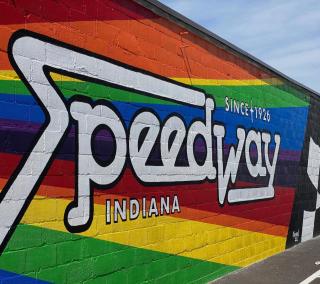 Rainbow-colored art mural located on Main Street