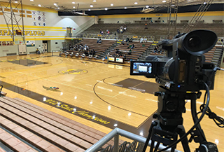 Video camera filming an empty gymnasium