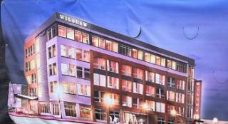 Banner of Wilshaw Hotel rendering once completed