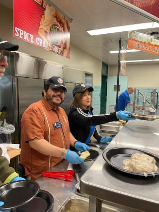 Lions Club serving food at the Pancake Breakfast Bazaar